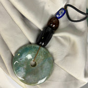 Amazonite donut with tiger’s eye, black onyx &amp; lapis lazuli beads
