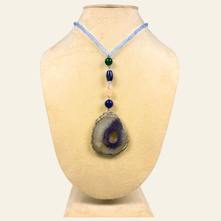 Blue Haven blends the protective strength of black onyx, the intuitive depth of lapis lazuli, and the serene grounding energy of blue agate.