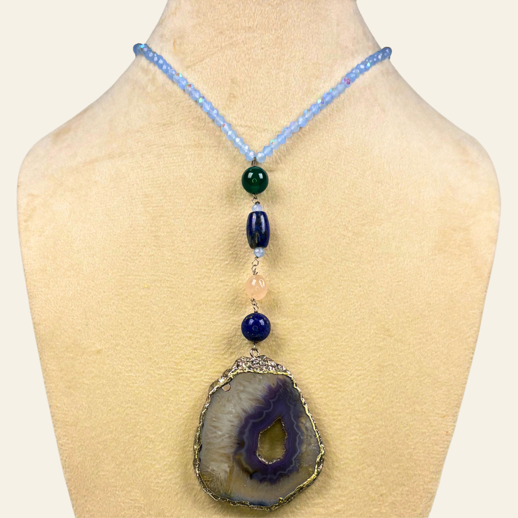 Blue Haven blends the protective strength of black onyx, the intuitive depth of lapis lazuli, and the serene grounding energy of blue agate.