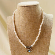 evil eye_necklace_peace_calm_protect_pearl_pyrite_gold_white_annutra