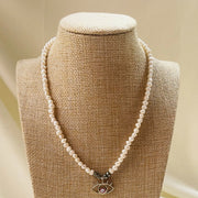evil eye_necklace_peace_calm_protect_pearl_pyrite_gold_white_annutra